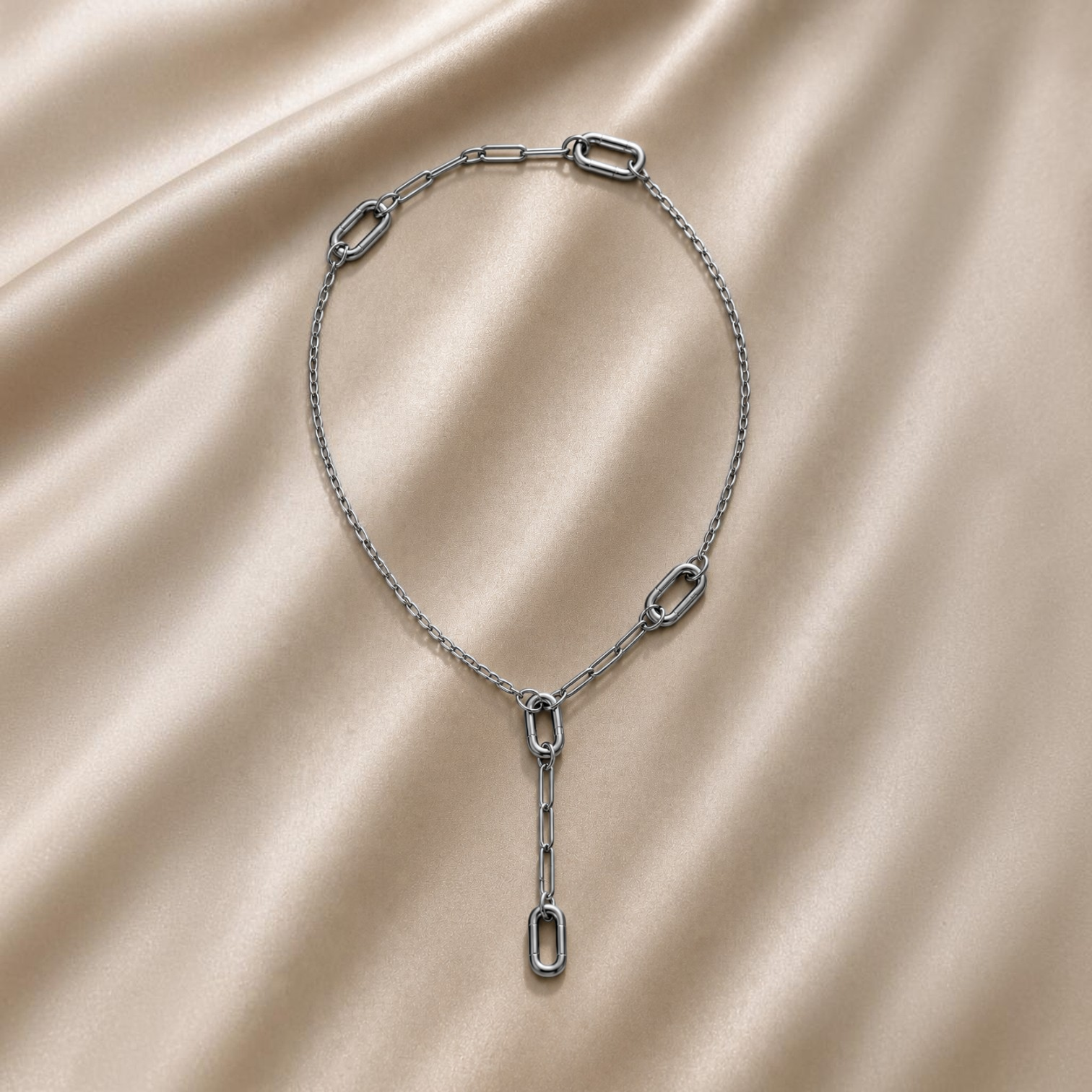 HOUSE OF EVEN Orbit Connector Necklace in polished silver stainless steel with three removable modular chain links.