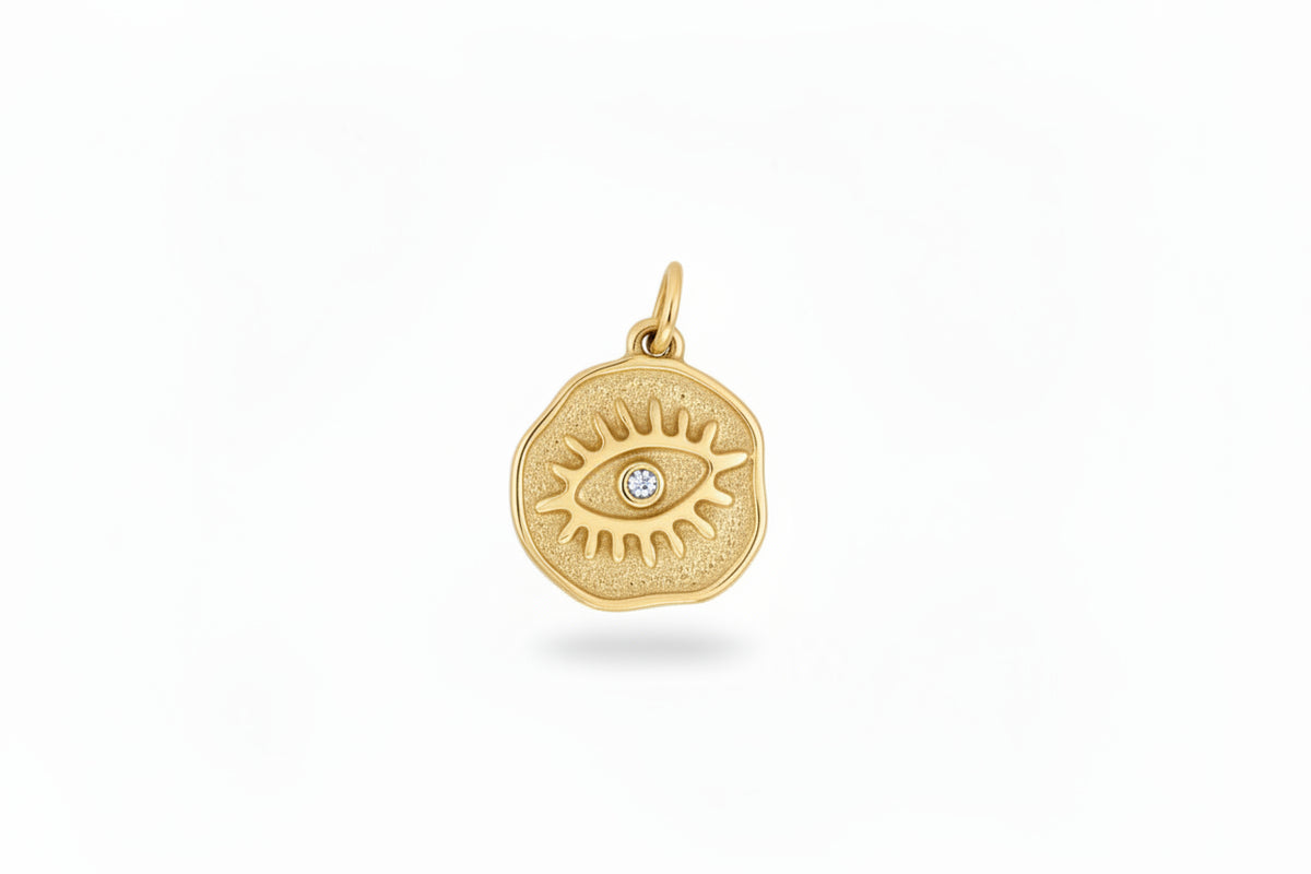 evil eye charm gold