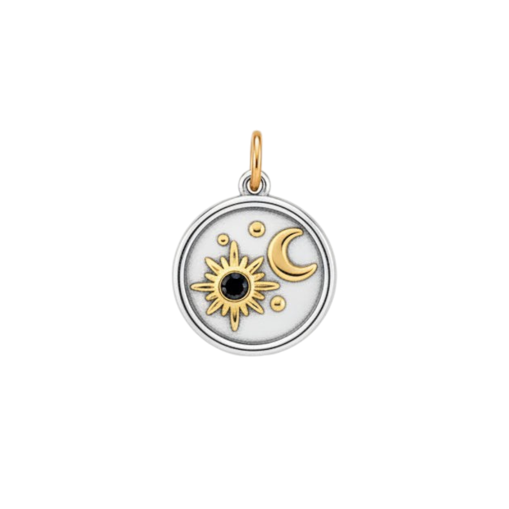 HOUSE OF EVEN Eclipse Charm featuring a two-tone silver and gold celestial medallion with a black zircon center.